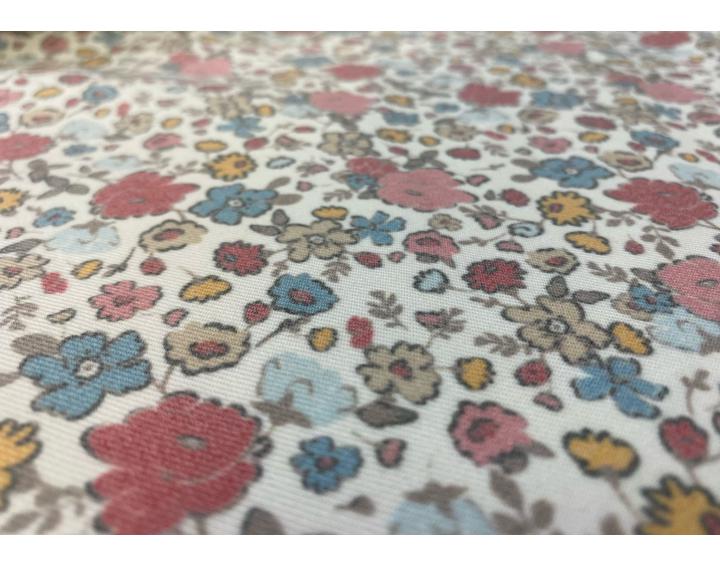 Viyela con estampado de flores en tonos rosas empolvados, azules y mostazas