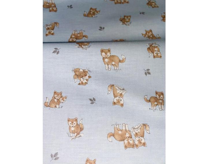 Tejido viyela fina con fondo azul cielo y estampado de gatitos