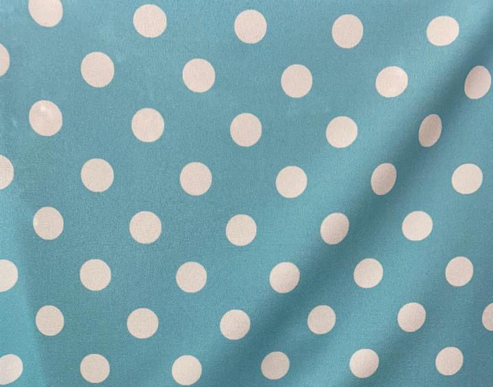 Tela stretch lunares blanco fondo azul