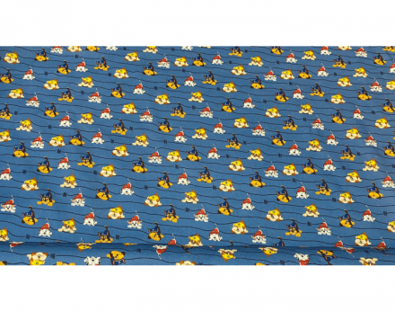 Tela algodón estampado patrulla canina con fondo azulón.