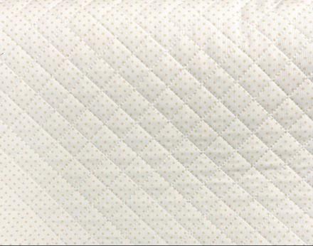 Piqué de Canutillo guateado Blanco con topito camel y forrado con tela fina impermeable