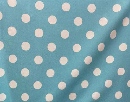 Tela stretch lunares blanco fondo azul