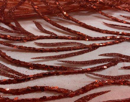 Tejido tul rojo con dibujo de lentejuelas y purpurina